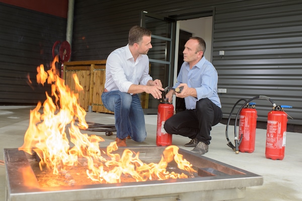 Fire Extinguisher Instructor and Student