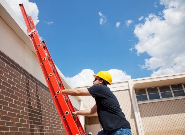 Man Climbing a Ladder