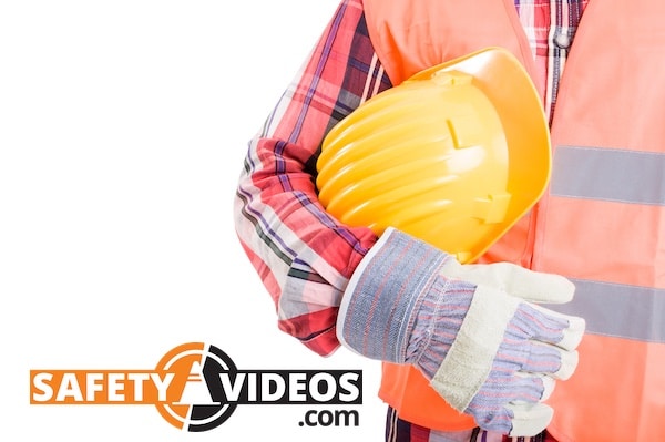 Worker Wearing Gloves Carrying Hard Hat