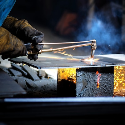 Welder Using a Cutting Torch