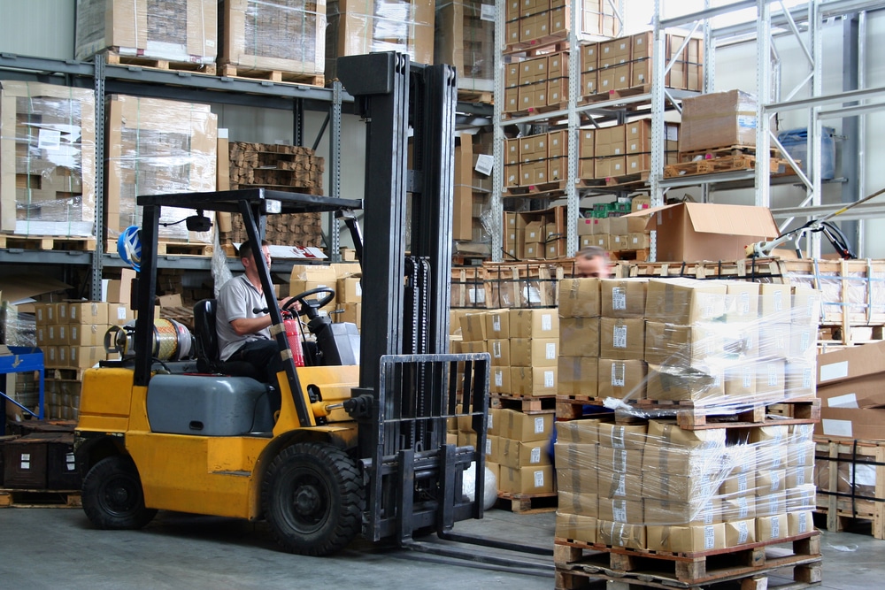 A forklift truck in a warehouse.
