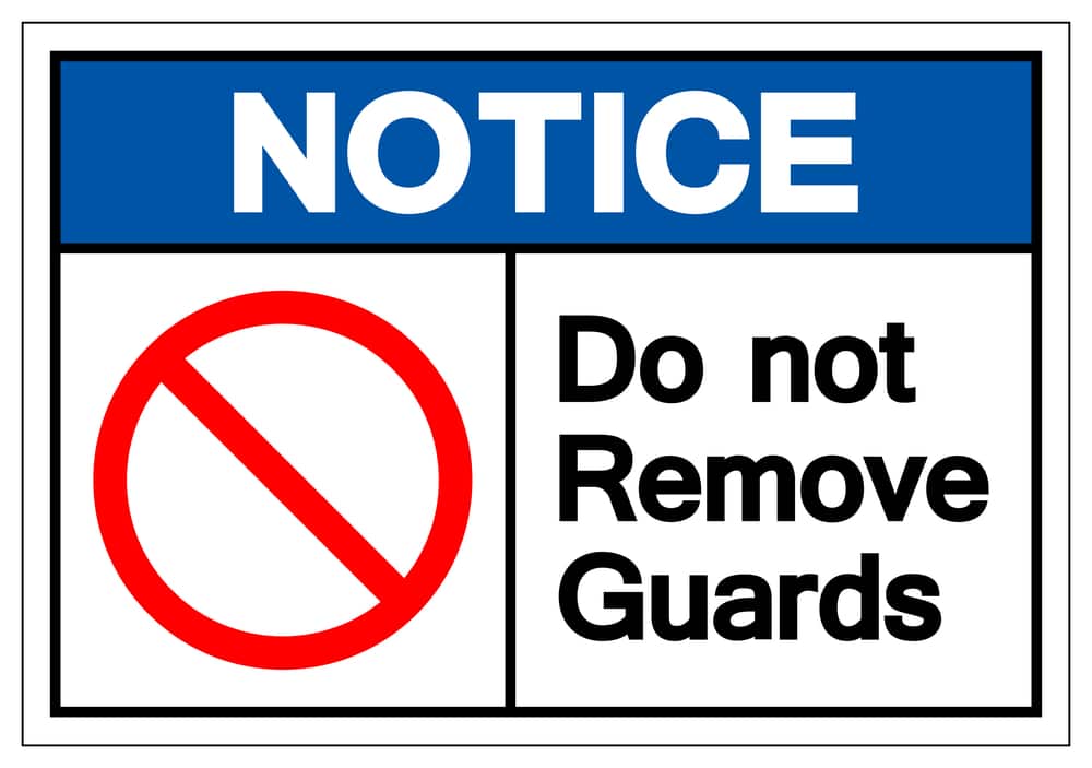 Notice do not remove guards sign.