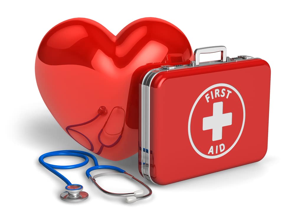 A first aid kit with a red heart and a stethoscope.