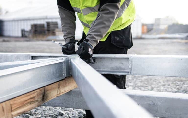 construction worker in vest and gloves