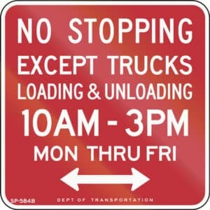 Red loading dock sign reading “No stopping except trucks loading and unloading 10AM–3PM Mon thru Fri.”